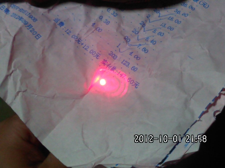 321激光照纸.jpg